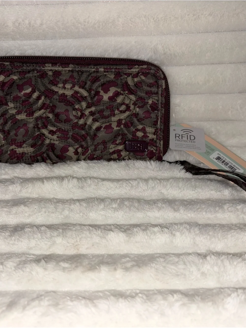 NWT-RFID Quilted Zip Wallet in Plum cheetah print